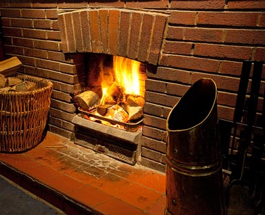 a roaring log fire burning sustainable, locally sourced Ludlow Firewood